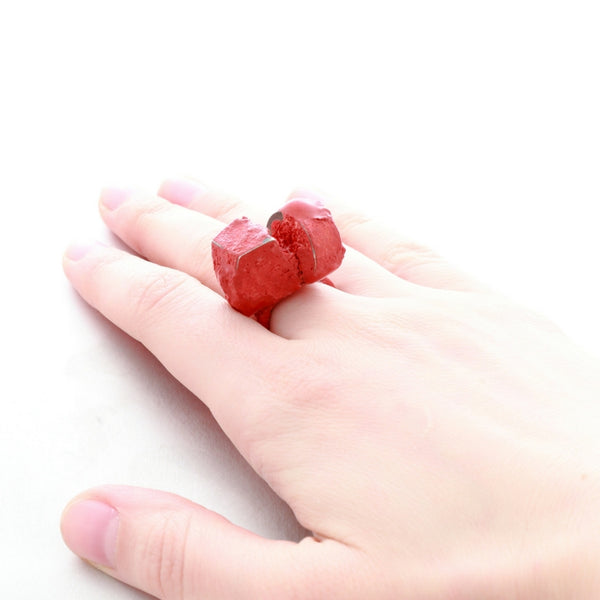 statement jewellery design Vienna. Red oxidised silver ring by Izabella Petrut