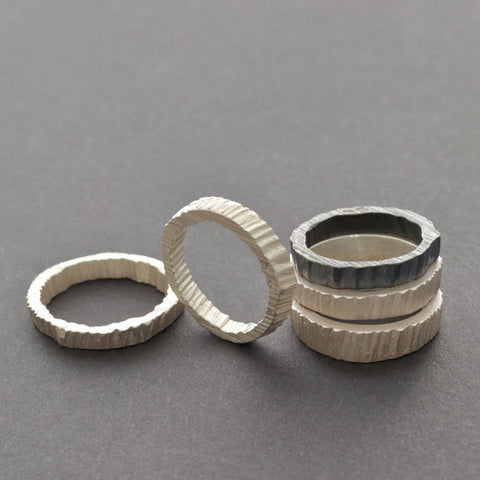 Stackable unique unisex silver rings with texture inside. Handmade in Vienna