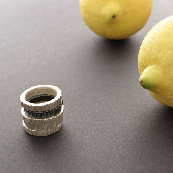 simple organic silver and oxidised silver rings, jewellery design Wien